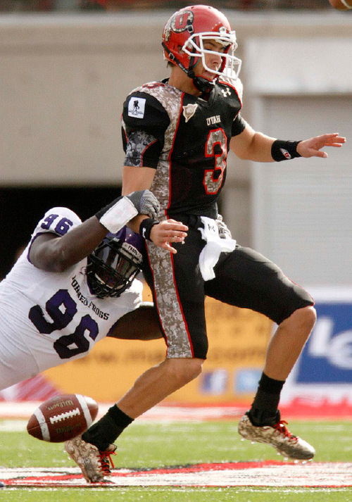 Trent Nelson  |  The Salt Lake Tribune&#xA;TCU's Wayne Daniels strips the ball from Utah quarterback Jordan Wynn during the first half, leading to a TCU touchdown. Utah vs. TCU college football, Saturday, November 6, 2010.