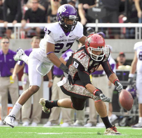 Michael Mangum  |  The Salt Lake Tribune&#xA;&#xA;Utah wide receiver Luke Matthews (11) drops a pass while defended by TCU cornerback Jason Teague (27) during the first half of play against the Horned Frogs at Rice-Eccles Stadium in Salt Lake City on Saturday, November 6, 2010.