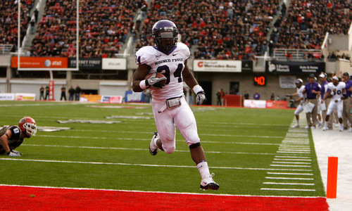 Trent Nelson  |  The Salt Lake Tribune&#xA;TCU's Ed Wesley easily scores on a short run during the second half, Utah vs. TCU college football, Saturday, November 6, 2010. TCU won 47-7.