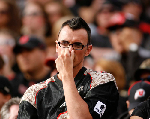 Trent Nelson  |  The Salt Lake Tribune&#xA;A Utah fan holds his nose during the second half, Utah vs. TCU college football, Saturday, November 6, 2010. TCU won 47-7.