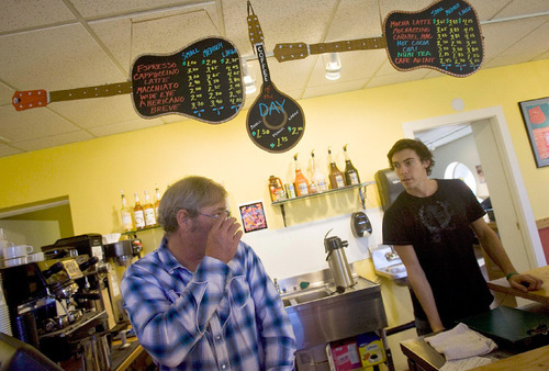 Djamila Grossman  |  The Salt Lake Tribune&#xA;&#xA;Park City Mayor Dana Williams talks to Steve Hart at Riffs, a guitar school, store and coffee shop in Park City, Wednesday, November 3, 2010. Williams is the co-manager of the place, owned by his friend Larry Hart. Steve is Larry's son.