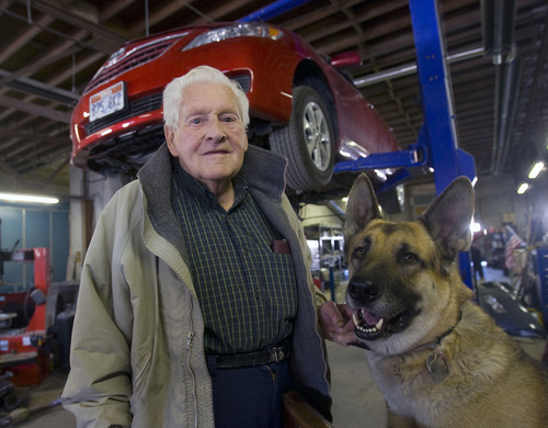 Al Hartmann  |  The Salt Lake Tribune
Cal Brown, 85, is a World War II veteran and the owner of Cal Brown Auto in Salt Lake City. For the past 60 years, he has been collecting history from his ship, the USS Salamaua, an aircraft carrier nearly sunk by Kamikazee pilots in the Phillipines. He served as a machinist on board. Today he still comes to his autoshop everyday to enjoy the work and the company of his dog 