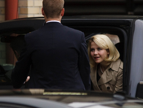 Leah Hogsten  |  The Salt Lake Tribune
Elizabeth Smart is escorted into Frank Moss Federal Courthouse in Salt Lake City to testify in the Brian David Mitchell trial on  Wednesday, Nov. 10, 2010.