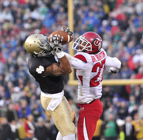 Michael Mangum  |  The Salt Lake Tribune

Utah defensive back Brandon Burton (27) breaks up a pass intended for Notre Dame wide receiver Michael Floyd (3) during the second half of play against the Fighting Irish at Notre Dame Stadium in South Bend, Indiana on Saturday, November 13, 2010.