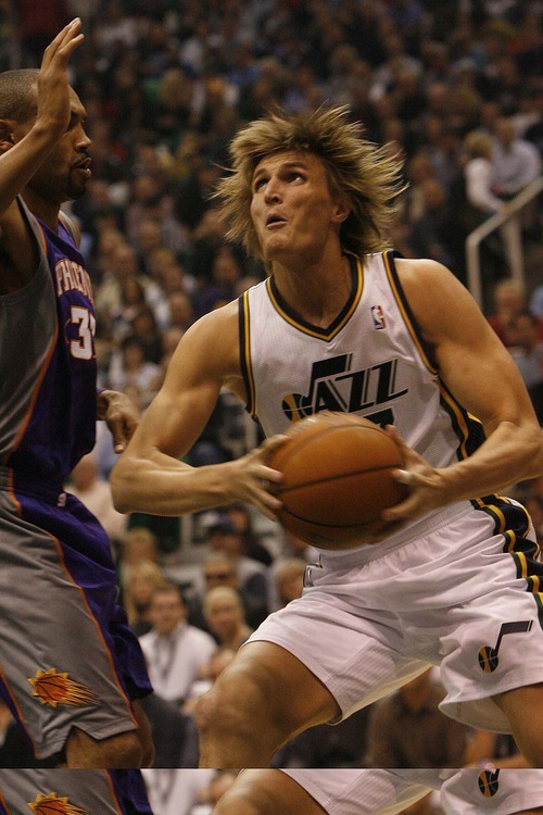 Chris Detrick  |  The Salt Lake Tribune 
Utah Jazz small forward Andrei Kirilenko #47 is guarded by Phoenix Suns small forward Grant Hill #33 during the first half of the game Thursday October 28, 2010.  Phoenix is winning the game 58-42.