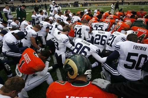 Trent Nelson  |  The Salt Lake Tribune
BYU players join Colorado State players for a post-game prayer. BYU vs. Colorado State, college football, Saturday, November 13, 2010. BYU won 49-10.