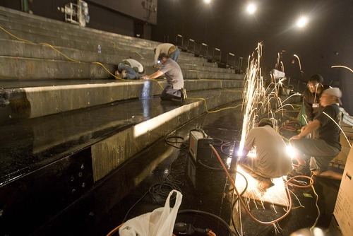 Paul Fraughton  |  The Salt Lake Tribune   
Sparks fly as a work crew prepares to install seats in the IMAX Theater at Clark Planetarium on Friday, Nov. 12, 2010.