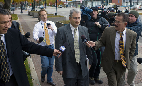 Al Hartmann  |  The Salt Lake Tribune
Tim Mitchell, brother of Brian David Mitchell, center,  leaves the Frank Moss Federal Courthouse in Salt Lake City on Thursday, Nov. 17.  He testified for the defense.  He had no comments for the media.