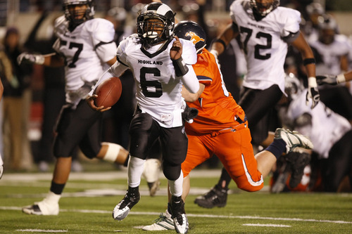 Chris Detrick  |  The Salt Lake Tribune 
Highland's Anthony Smithson #6 runs for a touchdown during the first half of the 4A Utah State Championship game at Rice-Eccles Stadium Friday November 19, 2010.  Mountain Crest is winning the game 9-7.