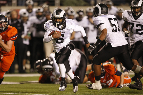 Chris Detrick  |  The Salt Lake Tribune 
Highland's Anthony Smithson #6 runs for a touchdown during the first half of the 4A Utah State Championship game at Rice-Eccles Stadium Friday November 19, 2010.  Mountain Crest is winning the game 9-7.