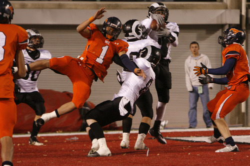 Chris Detrick  |  The Salt Lake Tribune 
Highland's Anthony Smithson #6 intercepts the ball in the endzone intended for Mountain Crest's Eddy Hall #1 during the second half of the game the 4A Utah State Championship game at Rice-Eccles Stadium Friday November 19, 2010.  Highland won the game 37-36 in double overtime.