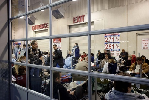 Trent Nelson  |  The Salt Lake Tribune
Hundreds of people were in line at dawn at Costco in Sandy on Friday, Nov. 19, 2010, waiting to have a book signed by former President George W. Bush. By 7 a.m., the line reached most of the way around the building.