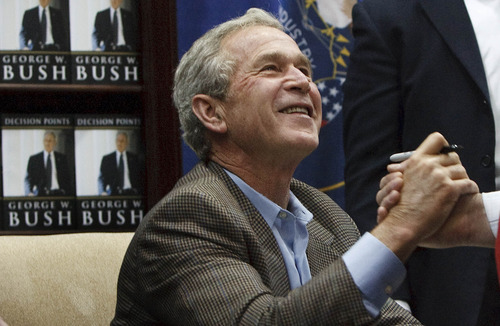 Leah Hogsten  |  The Salt Lake Tribune
Former President George W. Bush spent about two hours Friday signing his new book, 