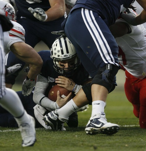 Trent Nelson  |  The Salt Lake Tribune
BYU quarterback Jake Heaps (9) dives for a touchdown during the first half,  BYU vs. New Mexico, Saturday, November 20, 2010.