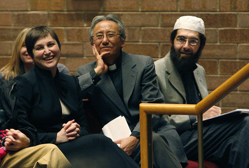 Scott Sommerdorf  l  The Salt Lake Tribune
From left, Rabbi Ilana Schwartzman, of Congregation Kol Ami; The Reverend EunSang Lee, of the First United Methodist Church, and Imam Muhammed Mahte, of the Khadeeja Mosque, Islamic Society of Greater Salt Lake, listen to the program at the Thanksgiving week interfaith prayer service that was held  at Congregation Kol Ami on Sunday.