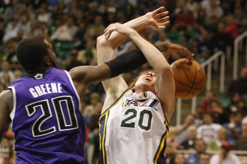 Chris Detrick  |  The Salt Lake Tribune &#xA;Utah Jazz small forward Gordon Hayward #20 is blocked by Sacramento Kings small forward Donte Greene #20 during the second half of the game at Energy Solutions Arena Friday October 22, 2010. The Jazz won the game 82-71.