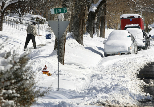 Scott Sommerdorf  l  The Salt Lake Tribune
Residents along 7th Avenue in Salt Lake City dug out last month after an overnight storm gave some parts of the city close to two feet of snow.