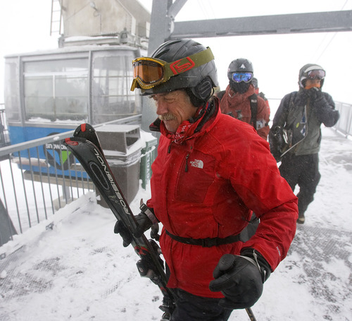 Al Hartmann  |  The Salt Lake Tribune 
Donald Derby exits the tram at the top of Snowbird's Hidden Peak recently for his first run of the day.  The temperature is -5, with gusty 30-mph winds and low visibility.  Just another day in paradise for Derby.   Last winter, he put together a spread sheet documenting all 133 days he skied, accumulating more than 6 million vertical feet, averaging 22 runs a day on days that lasted more than 6.6 hours. This year, at age 67, he plans to top that.