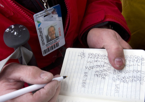 Al Hartmann  |  The Salt Lake Tribune 
Most mornings, Donald Derby is first or at the head of the line to catch the first Snowbird tram at 9 a.m.   He keeps notes of his ski runs while riding the tram to the top of Hidden Peak.