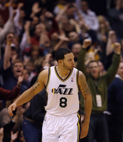 Trent Nelson  |  The Salt Lake Tribune
Jazz fans erupt as Utah Jazz guard Deron Williams (8) hits a shot to tie the game 96-96 with a little over a minute left. Utah Jazz vs. Los Angeles Lakers, NBA basketball Friday, November 26, 2010 at EnergySolutions Arena.