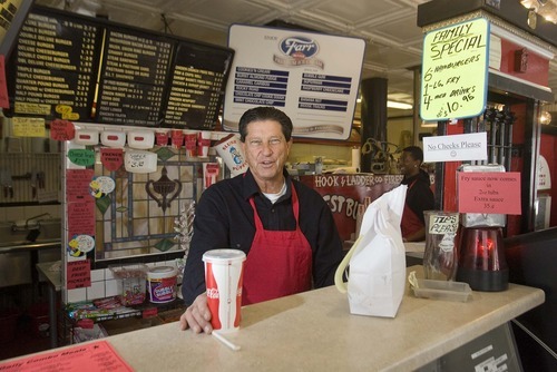 Paul Fraughton | The Salt Lake Tribune 
Salt Lake City Councilman Van Turner works Wednesday behind the counter of the Hook & Ladder, a burger restaurant he owns and operates on the west side.