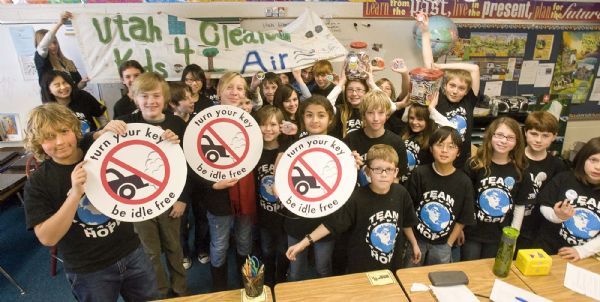 The students in Patti  White's sixth grade class at Morningside Elementary School  show off the signs, buttons and banners they have created to help promote non idiling of car engines.  The students are working with Rep. Carol Moss ( DHolladay)  to introduce a resolution  in the legislature  to encourage people to turn off their engines when they are waiting in their cars. Wednesday, January 13,2010  photo:Paul Fraughton/ The Salt Lake Tribune