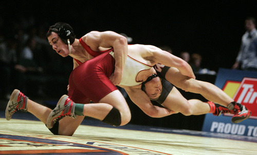 Jim Urquhart  |  The Salt Lake Tribune
Viewmont's Danner Kjar, bottom, wrestles Jayce Warren of Weber during high school championship wrestling Friday, February 12 2010 at Utah Valley University in Orem. Kjar won the 5A 145 pound title. 2/12/10