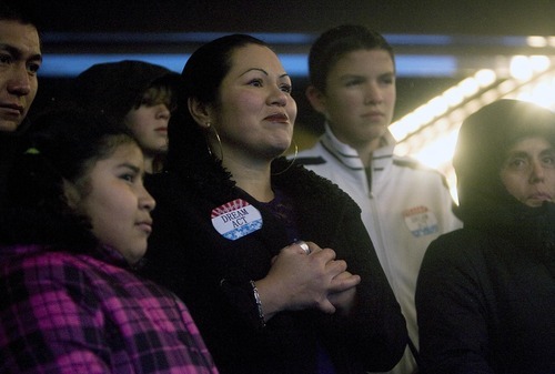 Djamila Grossman  |  The Salt Lake Tribune

Maricia Cervantes, 9, is joined by her parents, Alicia Cervantes and Armando Ramirez, and other supporters and community members in a gathering near Temple Square to pray for the passage of the DREAM Act, in Salt Lake City, Sunday, Nov. 28, 2010. The DREAM Act would create a path to legalization and citizenship for immigrant youth who serve the country through education or the armed forces.