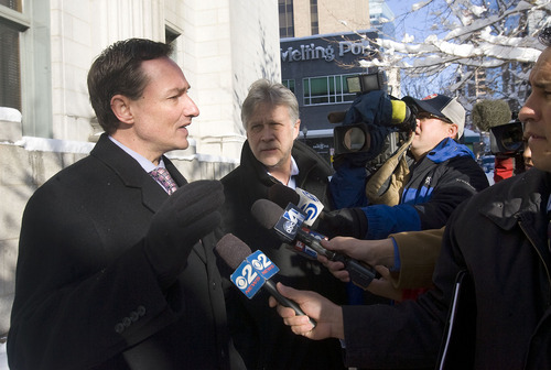 Al Hartmann  |  The Salt Lake Tribune 
David Lamb, left, a court appointed attorney who represented Brian David 
Mitchell in San Diego several years ago talks to reporters  at the Frank Moss Federal Courthouse on Monday November 29th.