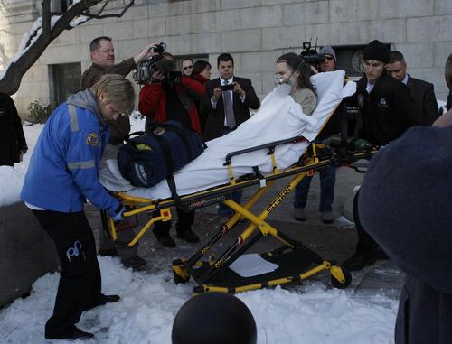Francisco Kjolseth  |  The Salt Lake Tribune
Brian David Mitchell is taken out of Federal Court in a stretcher after collapsing in court during his federal kidnapping trial in Salt Lake City on Tuesday, Nov. 30, 2010.