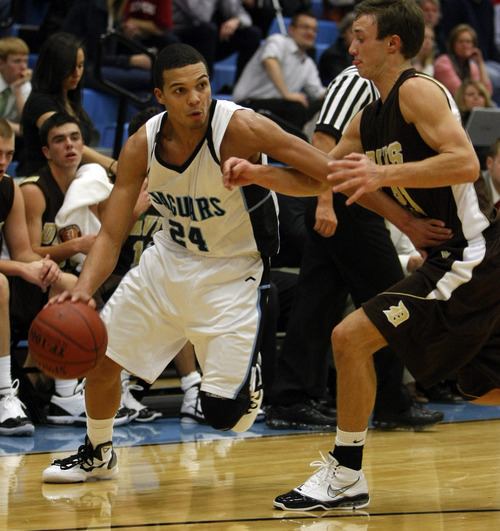 Chris Detrick  |  The Salt Lake Tribune 
West Jordan's Jordan Pryor #24 is guarded by Davis' Trever Webb #21 during the basketball game at West Jordan High School Tuesday November 30, 2010.