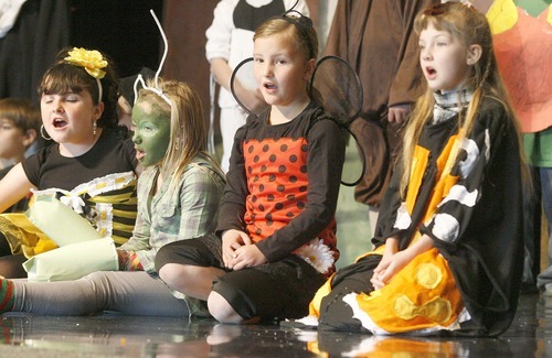 Paul Fraughton | The Salt Lake Tribune
Cherish Smith, left, RyLee Henry, Regan Pirtle and Brie Low  perform in Buffalo Point Elementary School's opera, 