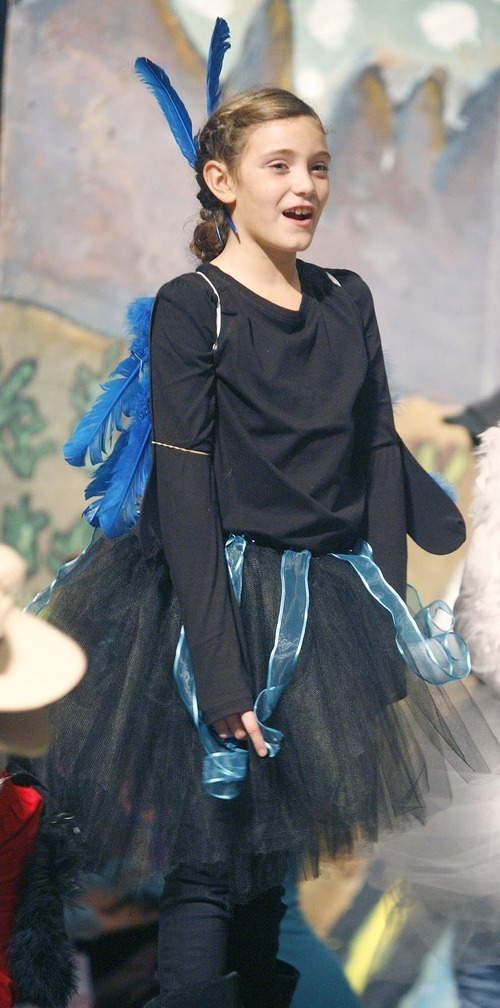 Paul Fraughton | The Salt Lake Tribune
Ashlynn Suarez plays a tree swallow in Buffalo Point Elementary School's opera, 