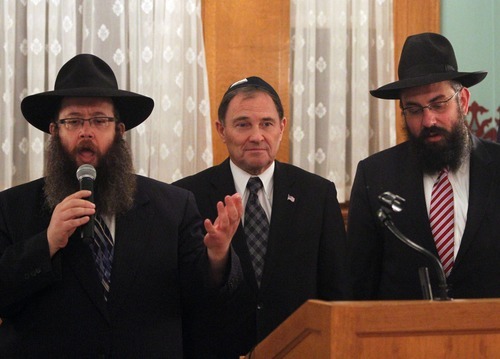 Rick Egan   |  The Salt Lake Tribune

 
Cantor Zalman Baumgarten (left) Gov. Gary Herbert, and Rabbi Benny Zippel (right) during the Chanukah Ceremony at the Governors Mansion, Thursday, December 2, 2010