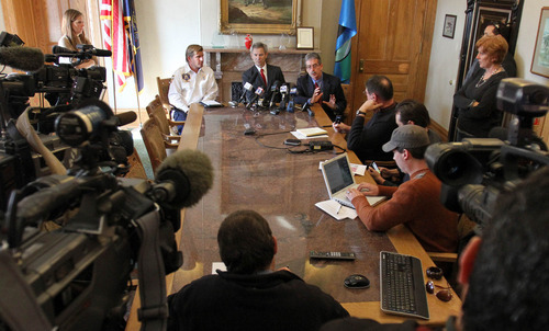 From left, public affairs officer Michael Harp, Salt Lake City Mayor Ralph Becker and Salt Lake City public utilities director Jeff Niermeyer speak at a press conference about a Chevron oil spill at the University of Utah. Approximately 100 barrels of crude oil was released near Red Butte Canyon.
Stephen Holt / Special to the Tribune