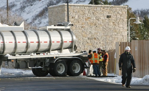 Steve Griffin  |  The Salt Lake Tribune
 
Authorities gather near the site of an oil spill by the Red Butte Amphitheater in Salt Lake City Thursday, December 2, 2010.