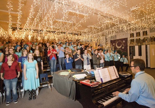 Paul Fraughton  |  The Salt Lake Tribune  Choir director at West Jordan High School, Kelly DeHaan,  rehearses  with the choir for an upcoming Christmas concert  with the Utah Symphony.