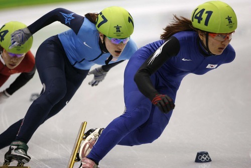 Trent Nelson  |  The Salt Lake Tribune
left to right: Zhou Yang (114- China, disqualified), Katherine Reutter (157- USA, silver), Park Seung-Hi (141- Korea, bronze). Women's 1000m final, Short Track Speed Skating at the Pacific Coliseum Vancouver, XXI Olympic Winter Games, Friday, February 26, 2010.