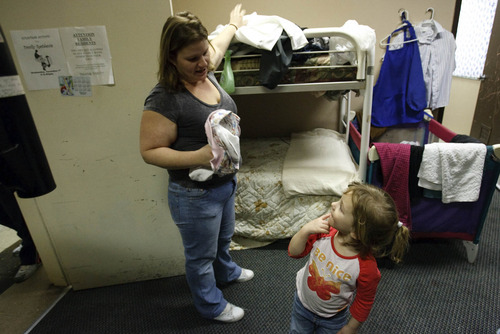 Leah Hogsten  |  The Salt Lake Tribune
Jennifer Tabura (left) talking to her daughter Heaven, 3,  has lived at the St. Anne's Center with her two daughters and her mother for two weeks. She must share a room with another family since the center only has four family rooms and the need for shelter is so great.  St. Anne's Center for the homeless and low-income in Ogden is raising funds to build a new center on land at 3300 South and Pacific Ave. The plan is to be able to start construction next summer and finish by spring 2012. The current shelter at 137 West Binford (2650 South) is dilapidated and too small to meet the current needs, since the recession has flooded the shelter with more families.   Friday, December 3, 2010, in Ogden.