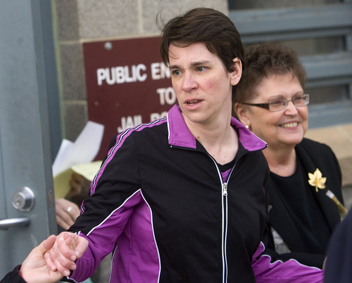 Al Hartmann  |  The Salt Lake Tribune 
Pamela Ann Mortensen leaves the Utah County jail hand in hand with her sister and mother, right,  just after noon on Wednesday, Dec. 8, after murder charges were dropped.