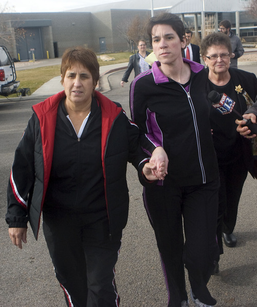 Al Hartmann  |  The Salt Lake Tribune 
Pamela Ann Mortensen, center,  leaves the Utah County jail hand in hand with her sister, left, and mother, right,  just after noon on Wednesday, Dec. 8, after murder charges were dropped.