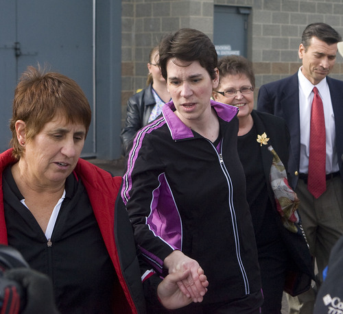 Al Hartmann  |  The Salt Lake Tribune 
Pamela Ann Mortensen, center,  leaves the Utah County jail hand in hand with her sister, left, and mother, right, just after noon on Wednesday, Dec. 8, after murder charges were dropped.