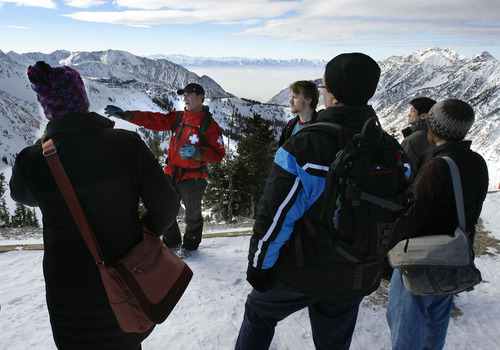 Steve Griffin  |  The Salt Lake Tribune
 
Dean Cardinale, center, director of the Snowbird ski patrol, talks to a group from the Society for Risk Analysis, from the top of Hidden Peak Sunday, Dec. 5, 2010. Cardinale showed the group how the ski patrol deals with the risks involved with keeping skiers safe at the resort.