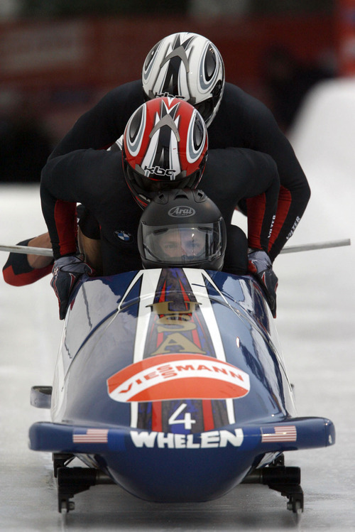 Francisco Kjolseth  |  The Salt Lake Tribune
John Napier of the United States drives his team down the track for the first run in Park City. Athletes from around the world competed in the World Cup tour in the four man bobsled at Utah Olympic Park in Park City on Saturday, Dec. 11, 2010.