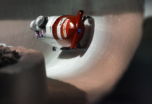 Francisco Kjolseth  |  The Salt Lake Tribune
Team Suizerland with driver Gregor Baumann rounds a turn as athletes from around the world compete in the World Cup tour in the four man bobsled at Utah Olympic Park in Park City on Saturday, Dec. 11, 2010.