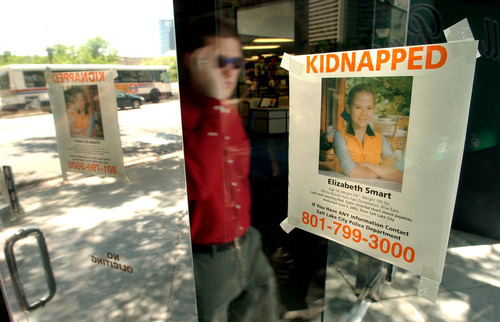 Francisco Kjolseth  |  The Salt Lake Tribune

Two weeks following the kidnapping of Elizabeth Smart in 2002, few answers had developed as posters of the missing girl were put up all over the city.