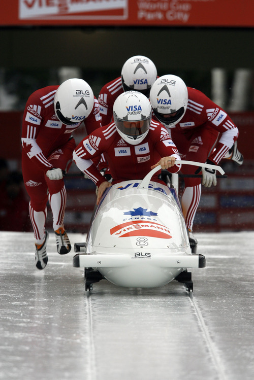 Francisco Kjolseth  |  The Salt Lake Tribune
Canadian athletes Lyndon Rush, Chris Le Bihan, Cody Sorensen and Neville Wright start of the first round of the 4-Man Bobsled competition. Athletes from around the world compete in the World Cup tour in the four man bobsled at Utah Olympic Park in Park City on Saturday, Dec. 11, 2010.