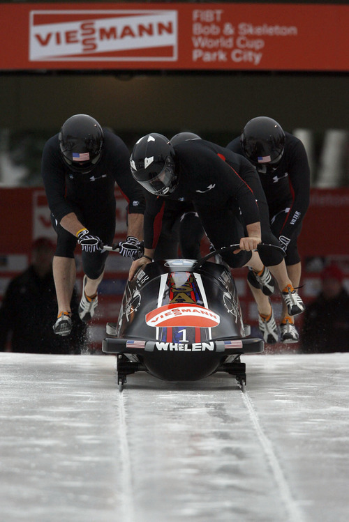 Francisco Kjolseth  |  The Salt Lake Tribune
Team USA with Steven Holcomb, Justin Olsen, Steven Langton and Curtis Tomasevicz climb into their sled for their first run in Park City in the four man bobsled event. Athletes from around the world competed in the World Cup tour in the four man bobsled at Utah Olympic Park in Park City on Saturday, Dec. 11, 2010.