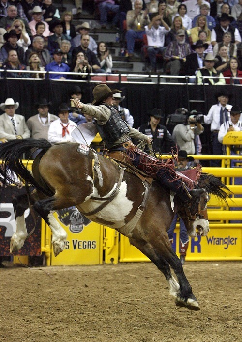 Trent Nelson  |  The Salt Lake Tribune
Cody Wright of Milford, Utah, wins the Saddle Bronc World Championship at the National Finals Rodeo in Las Vegas Saturday, December 11, 2010.