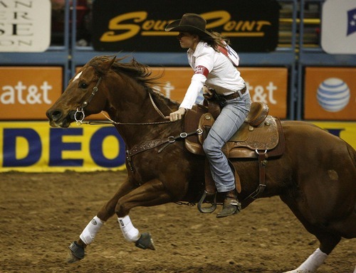 Trent Nelson  |  The Salt Lake Tribune
Kelli Tolbert of Hooper, Utah, competing in Barrel Racing at the National Finals Rodeo in Las Vegas Saturday, December 11, 2010.